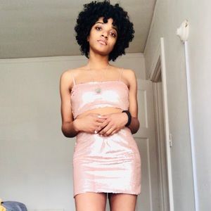 Rose colored sequin skirt set.